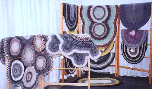 a selection of braided Karakul wool rugs